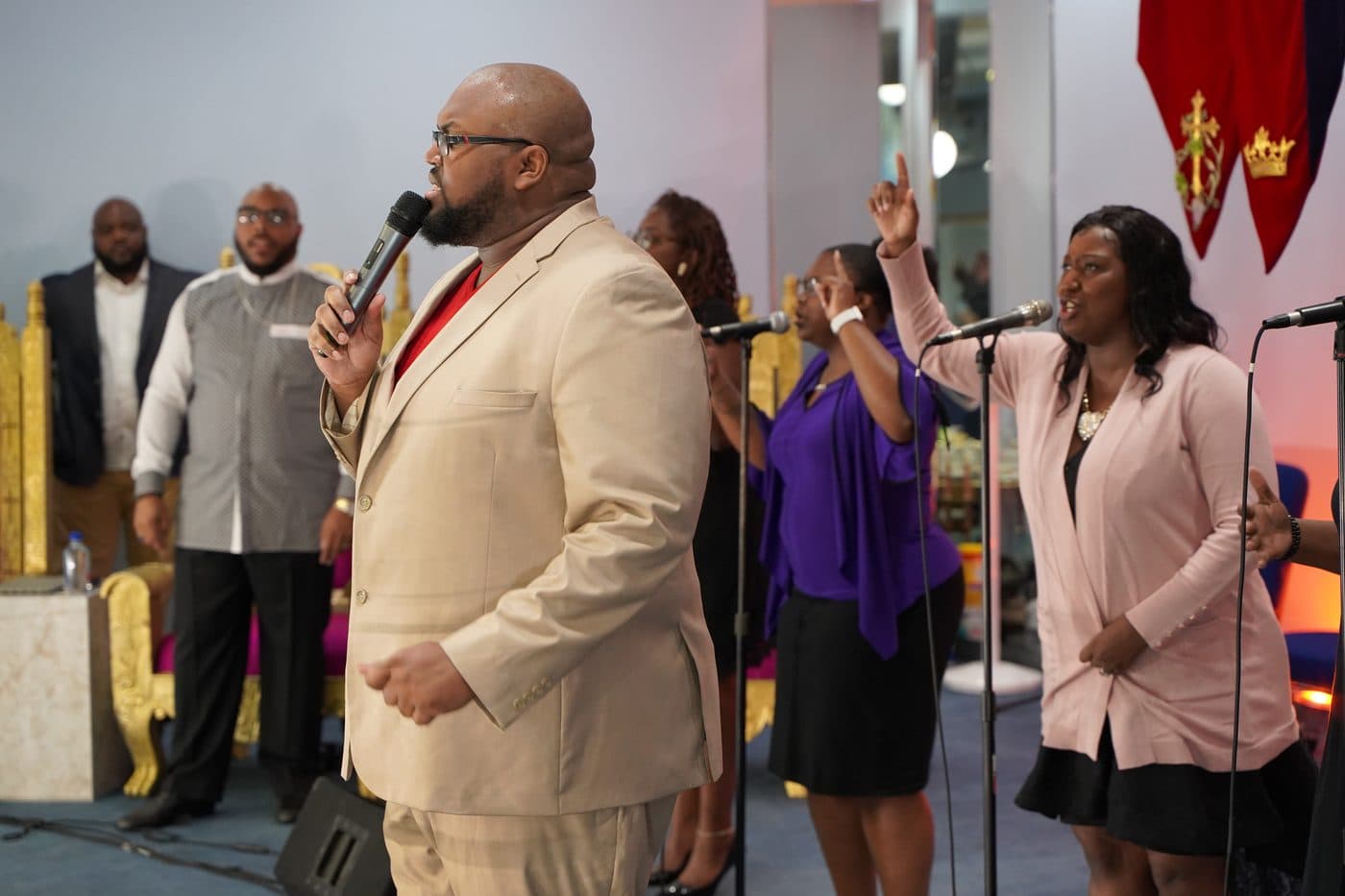 Pastor Charles leading worship